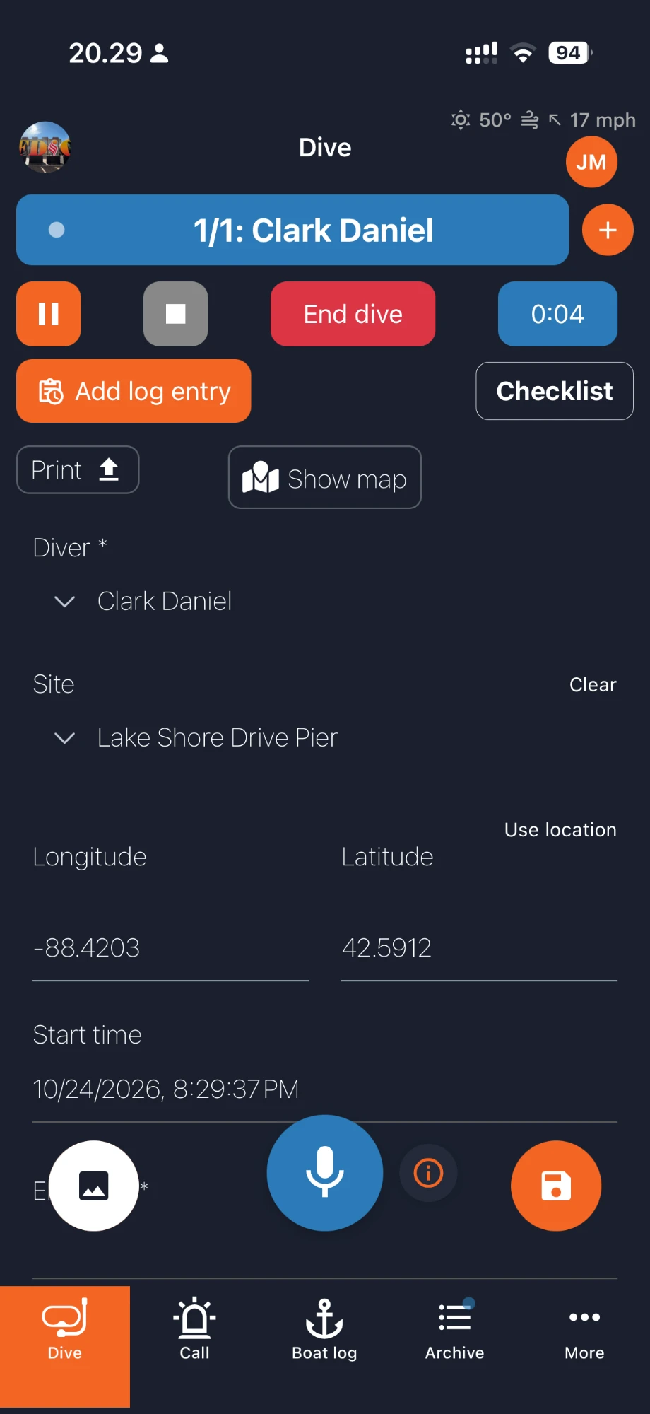 OpsLogger dive screen with a running diver timer, pause, stop and end dive buttons